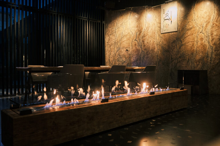 Olluco's fireplace gives a warm ambiance to the restaurant